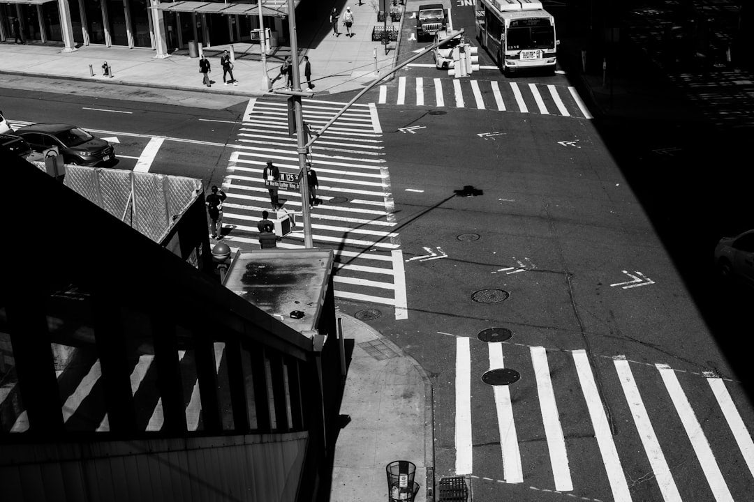 a black and white photo of a city street